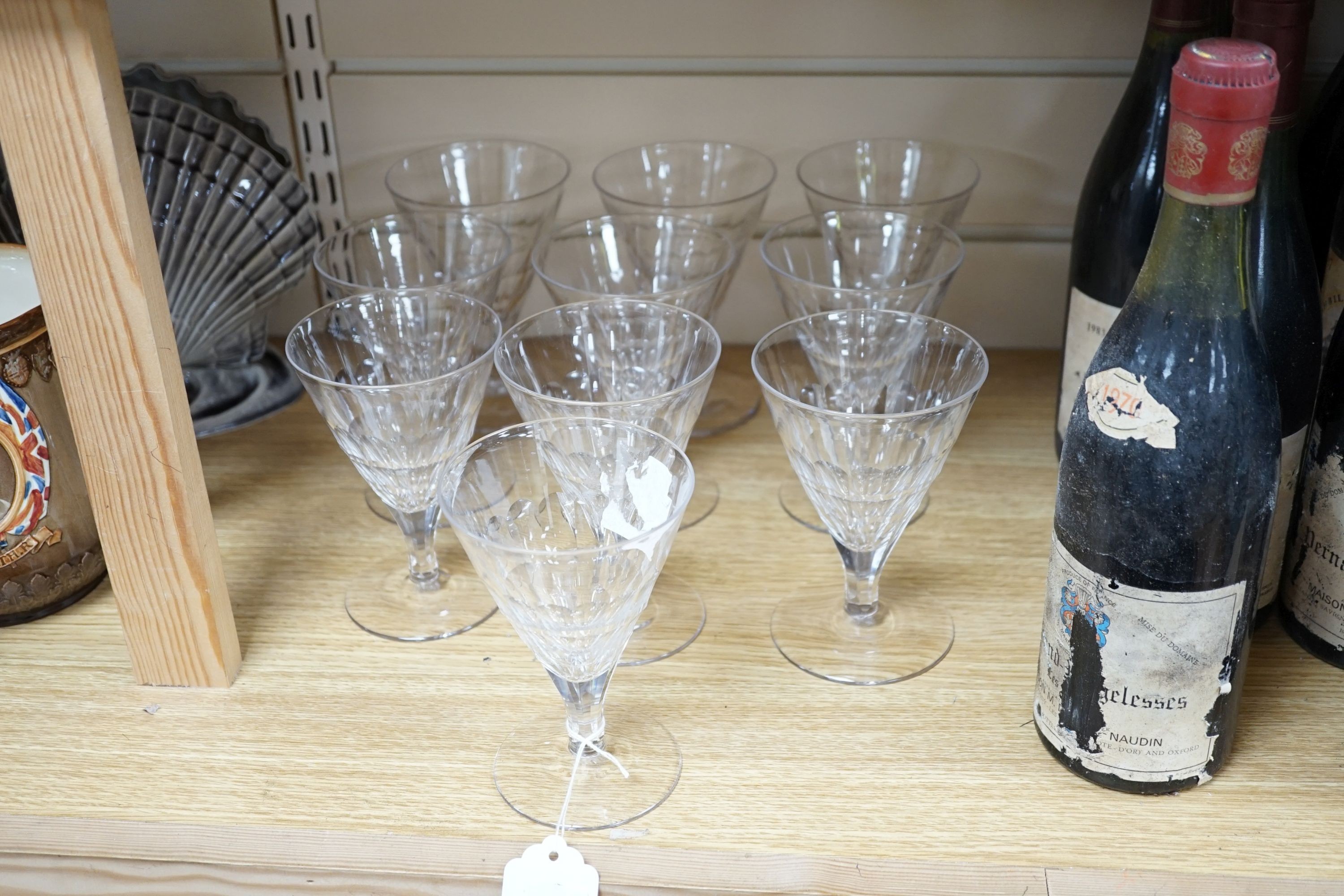 A set of ten facet cut conical wine glasses, 14cm